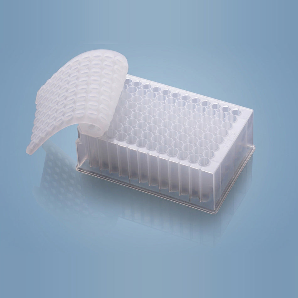 NEST Silicone Sealing Mat Being Applied to 24-Well Deep Well Plate